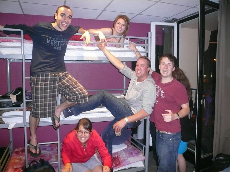young people in a youth hostel dormitory