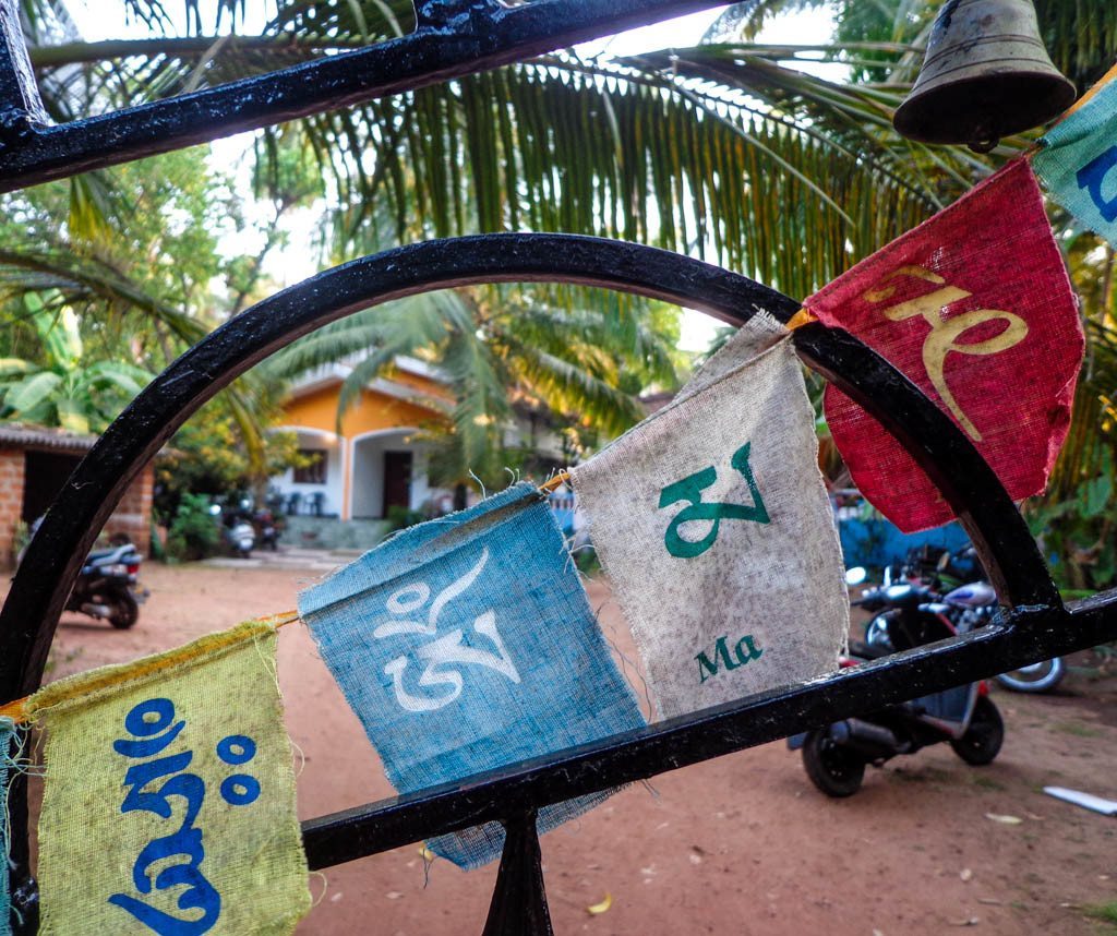 Peering through the gate at our cute little house in Goa