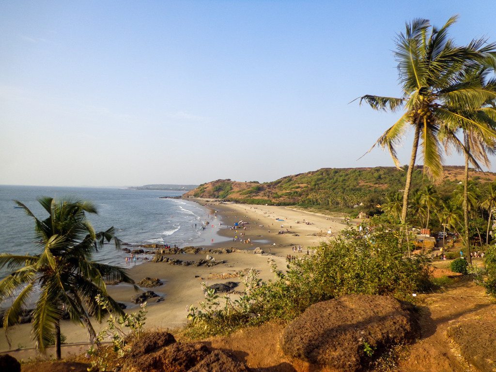 Views over rocky and charismatic Vagator Beach