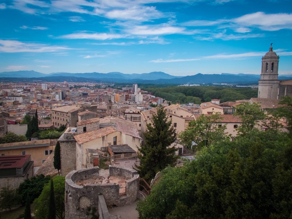 views over Girona to the Pyrenees from the old city walls 