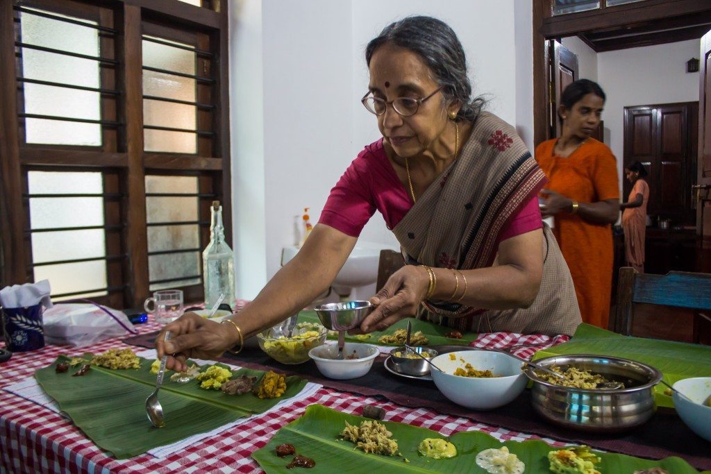 Serving a traditional Kerala lunch at Pranavam Homestays