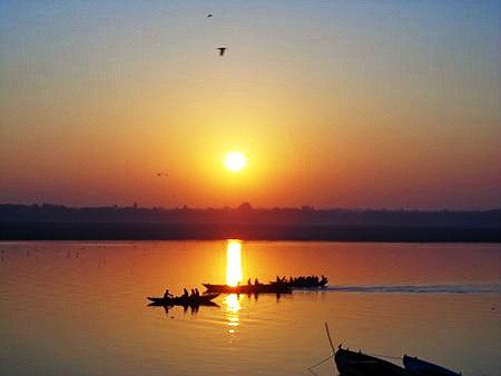 sunrise over the Ganges river in Varanasi 