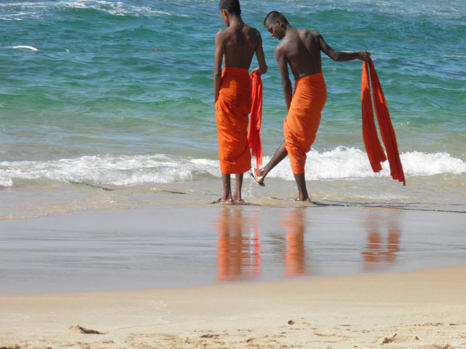 Monks on the beach in Sri Lanka