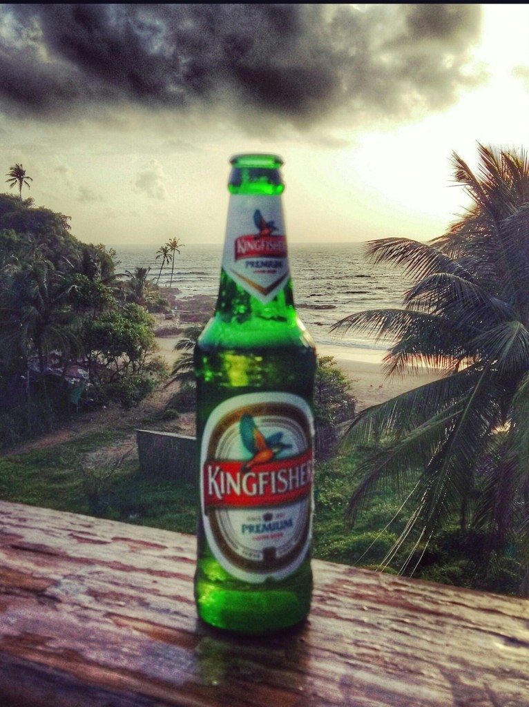 Enjoying a Kingfisher beer at sunset overlooking Vagator Beach