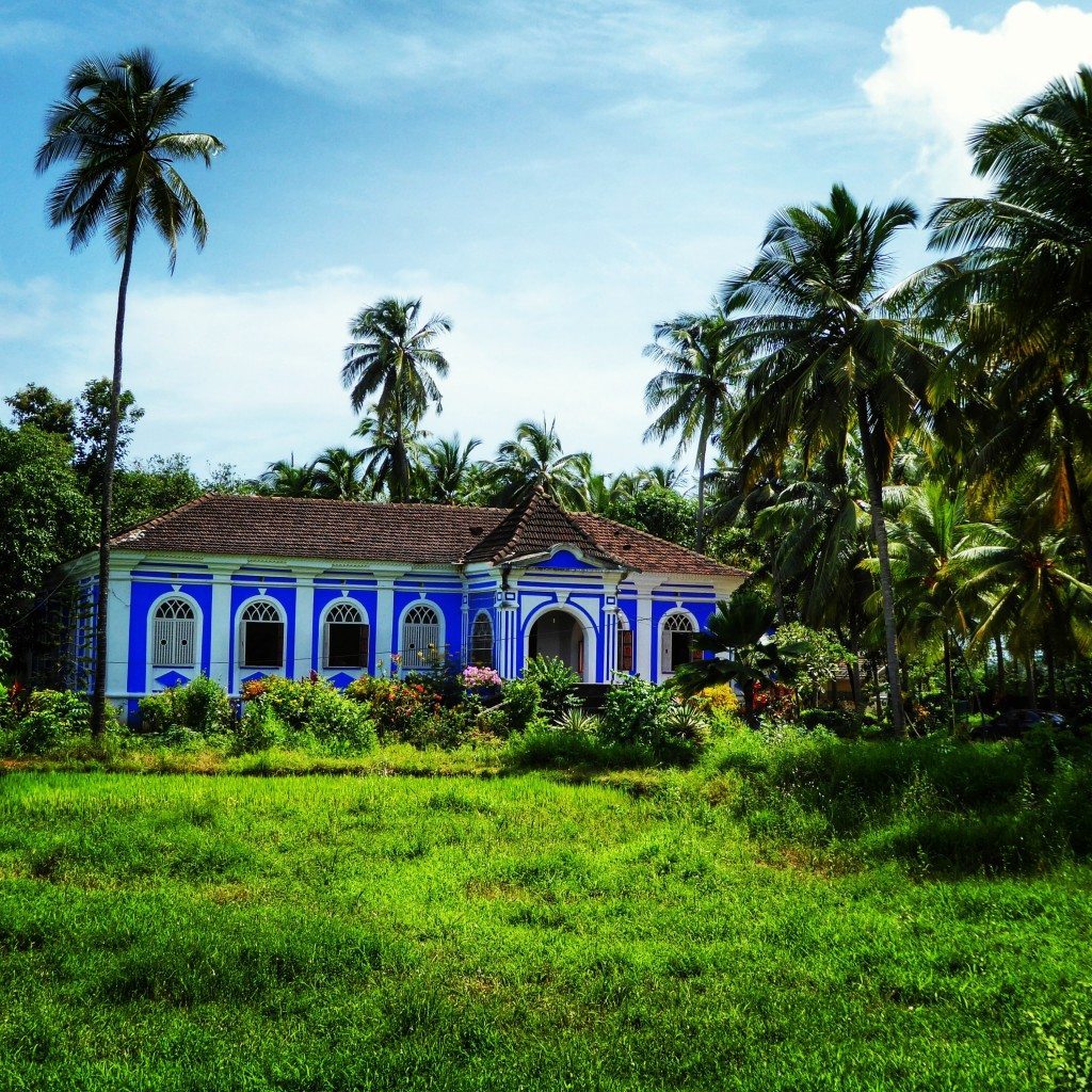 Colourful Portuguese villas and green paddy fields in Goa