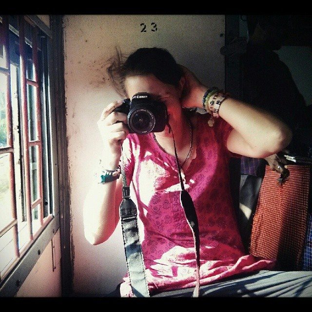 Taking photos with a DSLR on the train in India