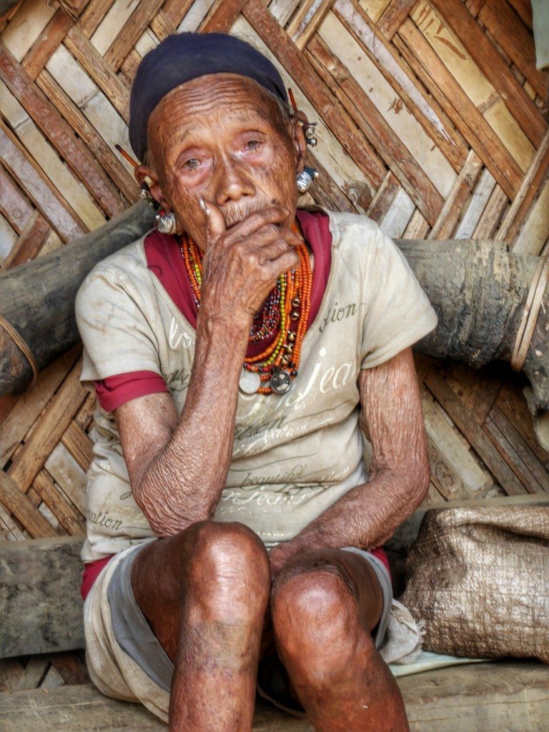 Konyak woman - notice the tribal tattoos on her legs