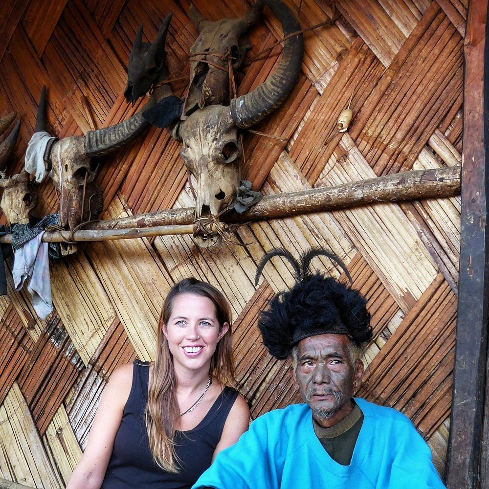 With a Konyak man at his home in Longwa