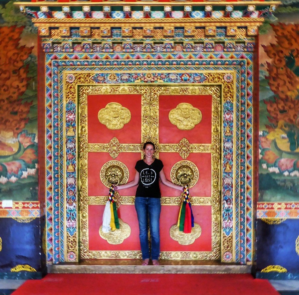 At the colourful doors of the monastery