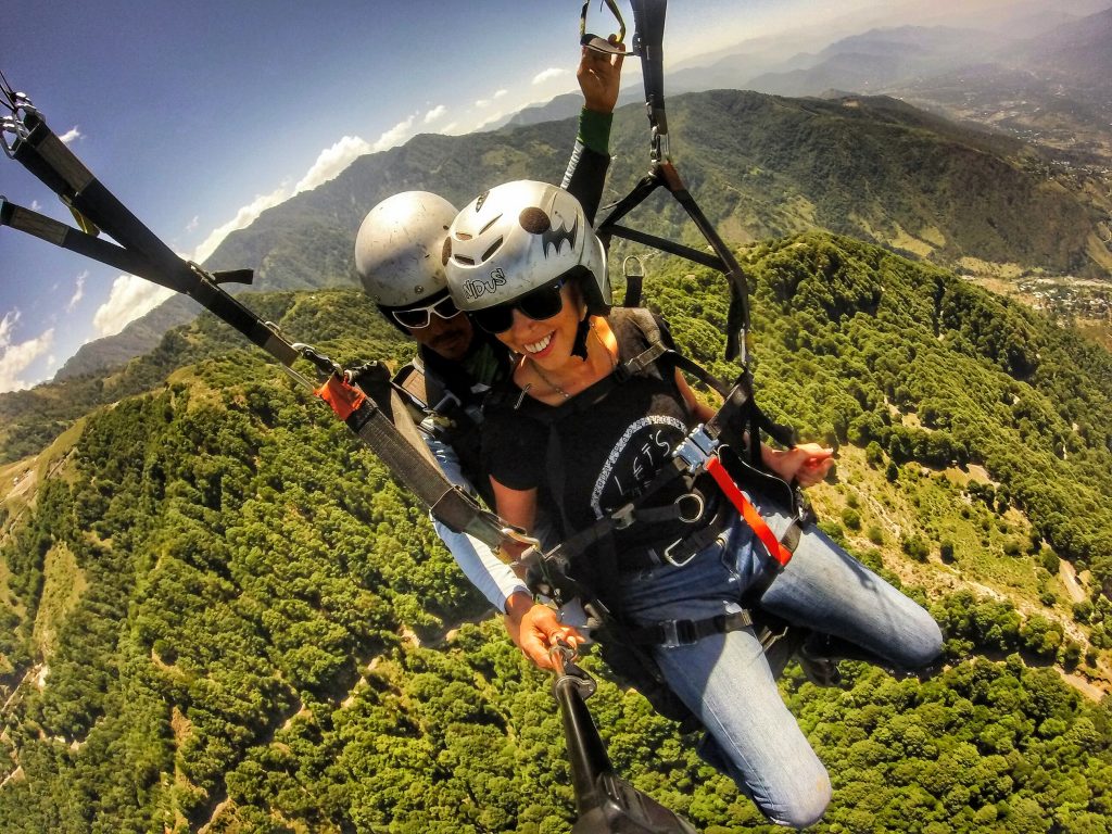 Anna from Global Gallivanting paragliding in Bir Billing, Himachal Pradesh, North India