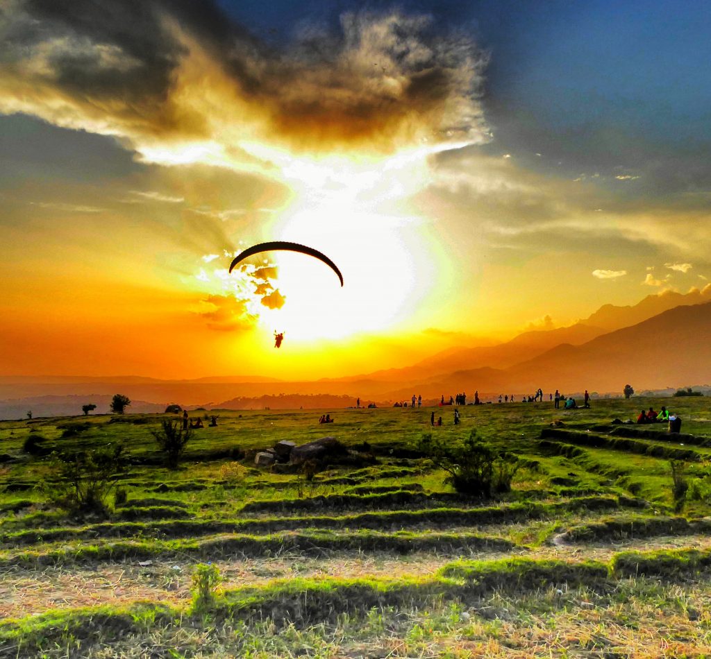 Sunset over the paragliding landing spot in Bir Billing. Himachal Pradesh, India