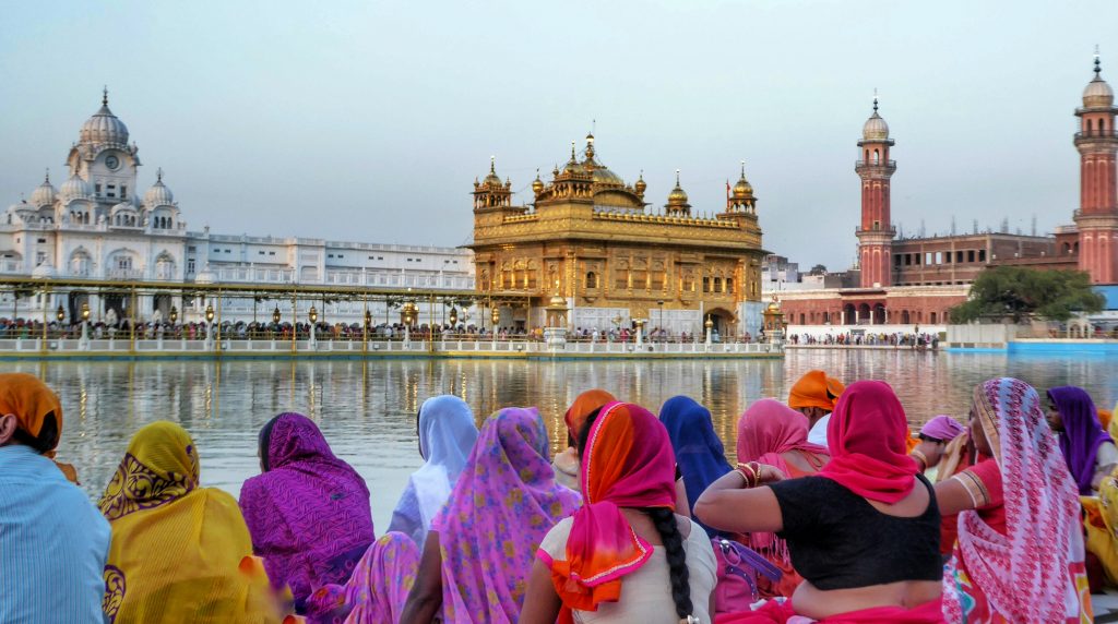 colourful pilgrims at the golden temple 