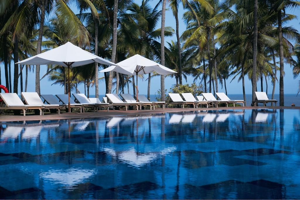 the pool at vivanta by taj holiday village one of the best luxury hotels in goa
