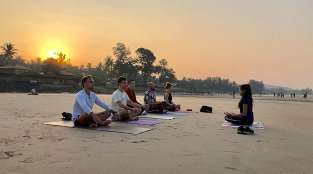 yoga-at-sunset-on-the-beach-in-goa-with-preksha-yoga-ashram