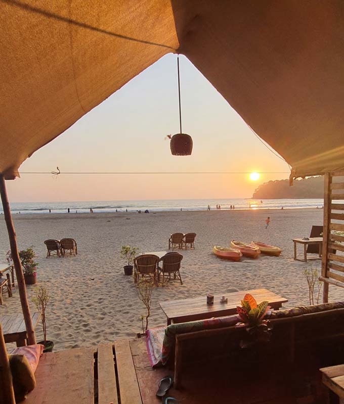 view from agonda beach shack at sunset