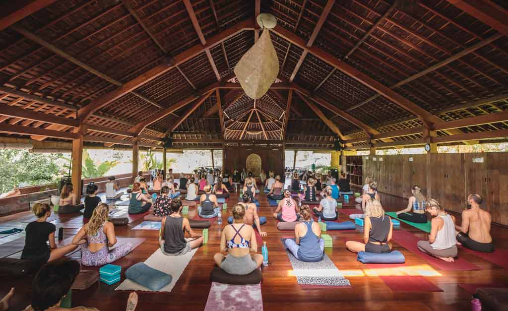 Taking a Vinyasa class at The Yoga Barn in Ubud