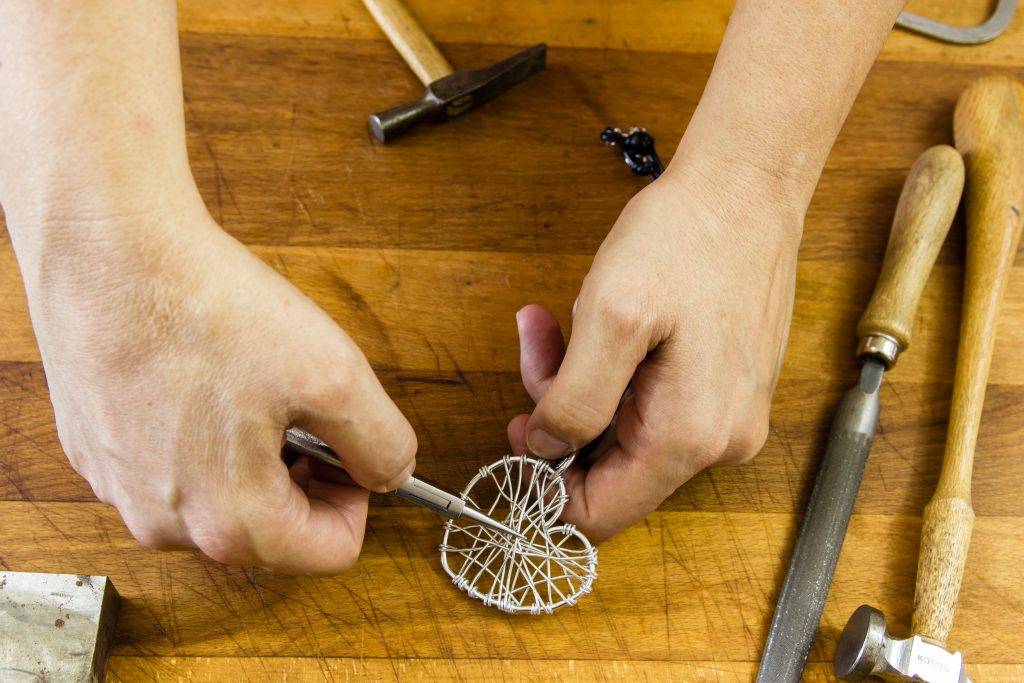 Jewellery making class. Photo credit: Goghy73 (Shutterstock)