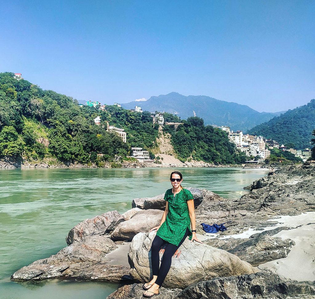 Anna in rishikesh by the ganges river