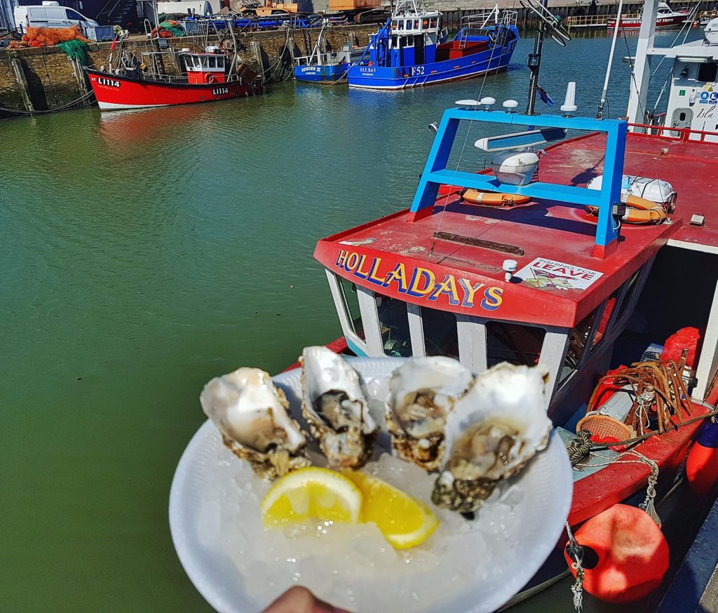 Bargain oysters in Whitstable Harbour
