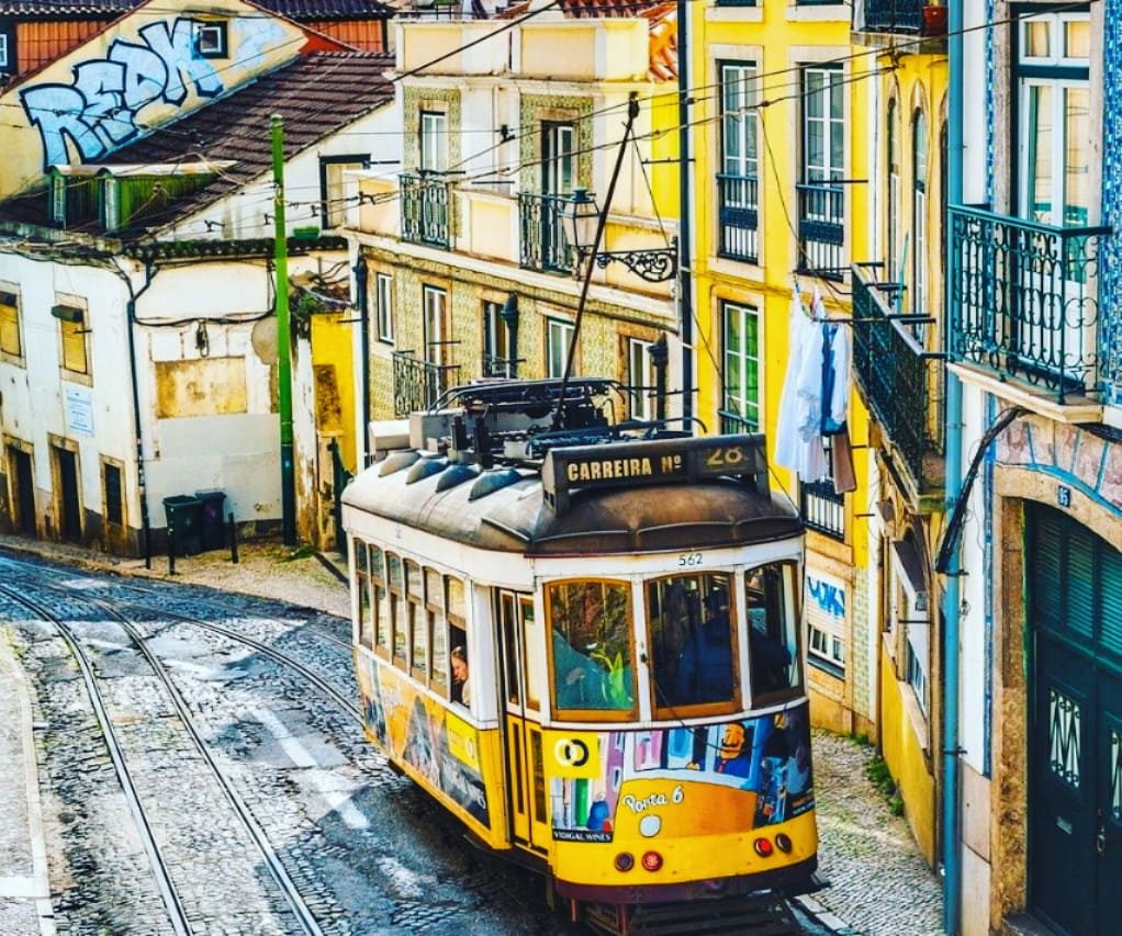 lisbons trams are a highlight of a portugal road trip