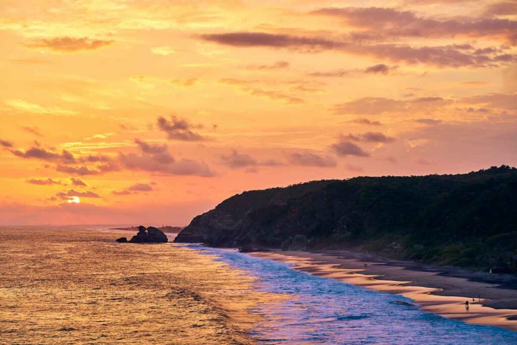 sunset from punta cometa over playa mermejita mazunte oaxaca mexico