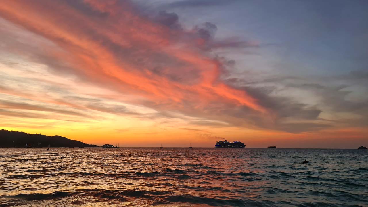 Patong beach sunset. Photo by Trekking The Dream