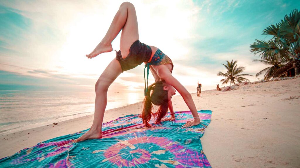 Yoga on the beach in Koh Phangan, Thailand