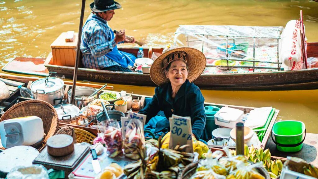 floating-market-woman-vendor-bangkok-1280-op