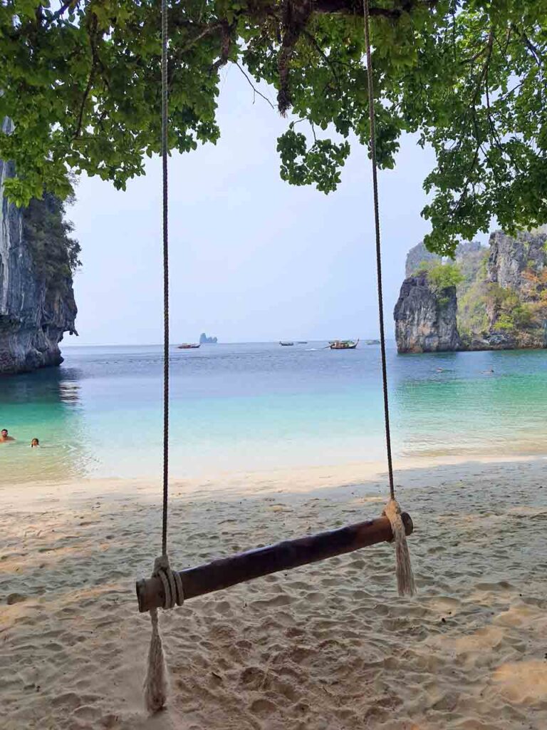 swing on the hong islands beach krabi thailand