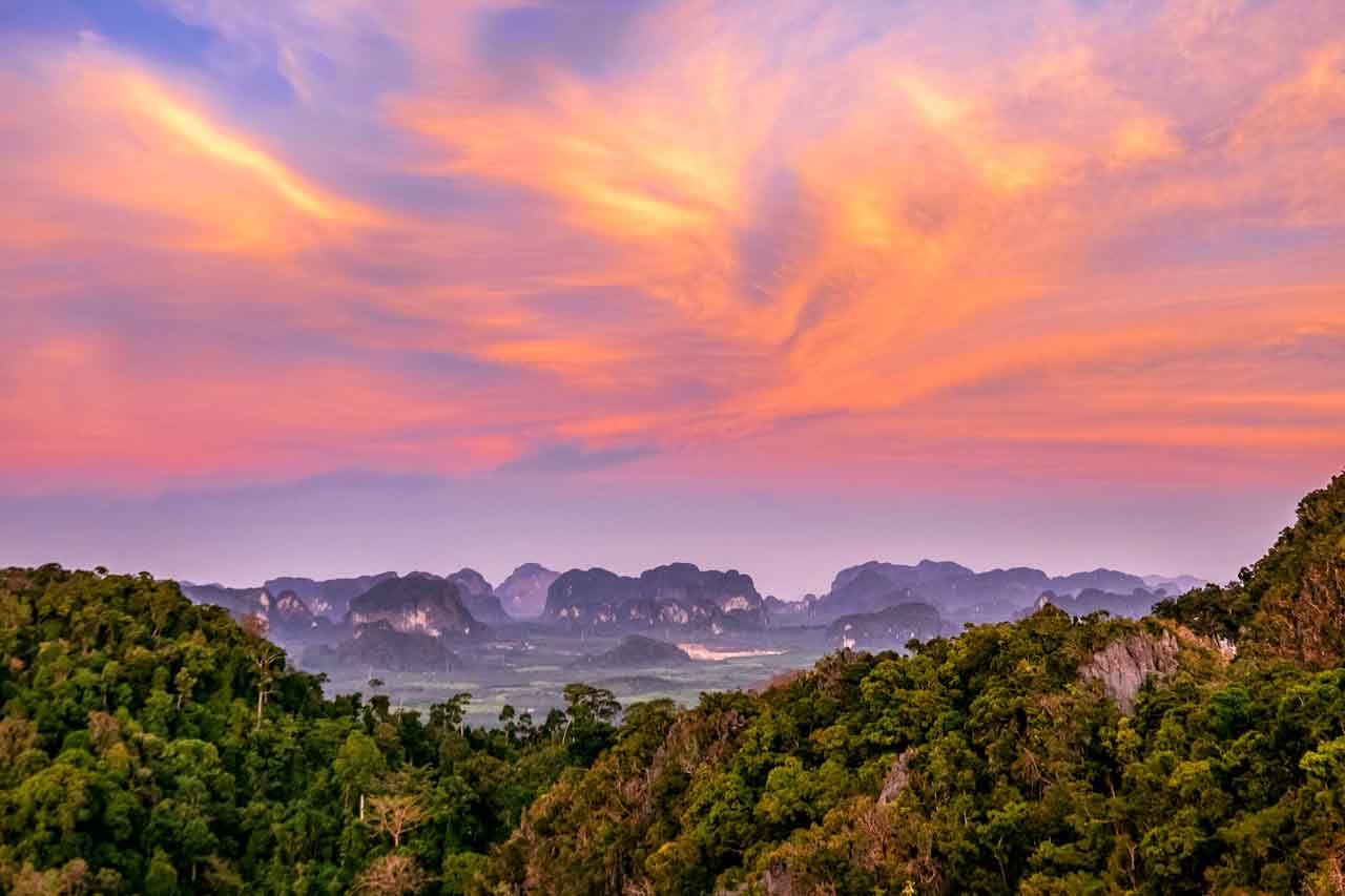 sunset over krabi's rocks and jungle