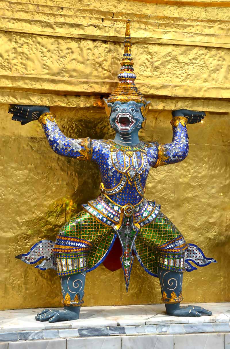 statue at the temple of the emerald buddha in the grand palace, bangkok
