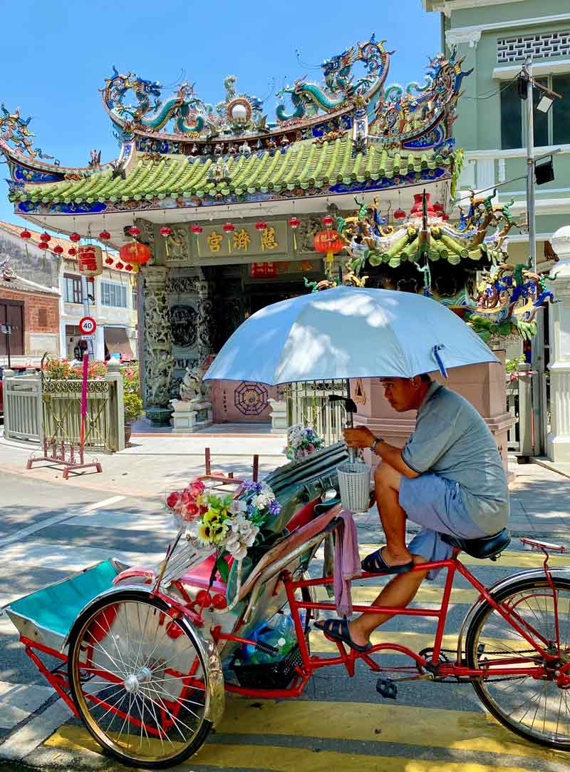 Trishaw outside a temple in Georgetown, Penang