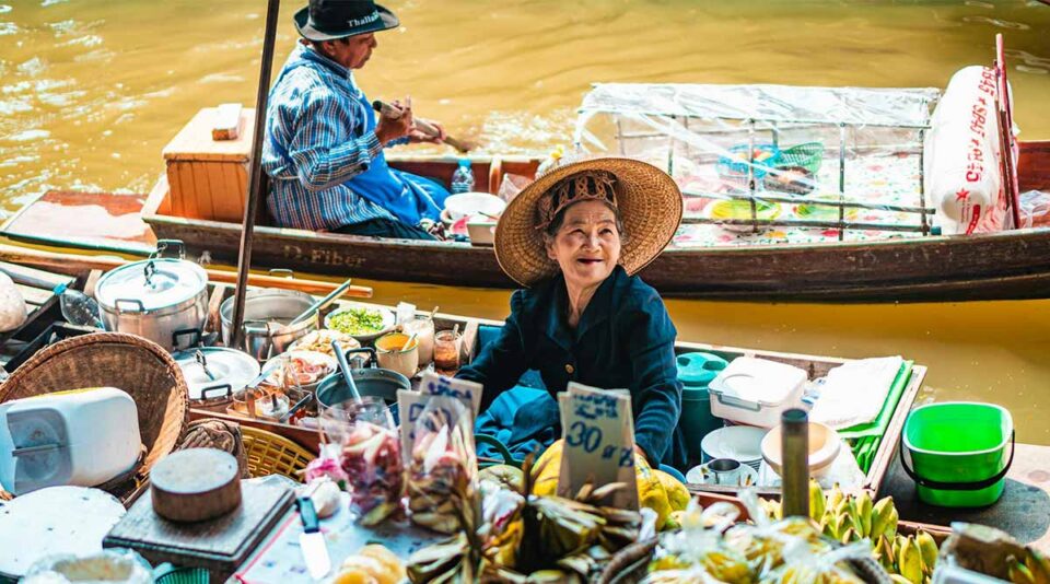 the floating markets are the one of the best day trips from bangkok