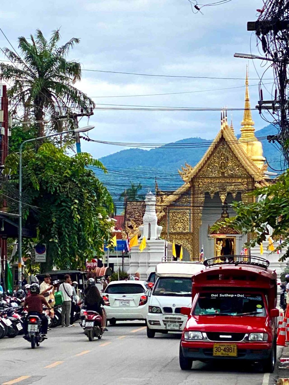 Chiang Mai streets temples and red trucks