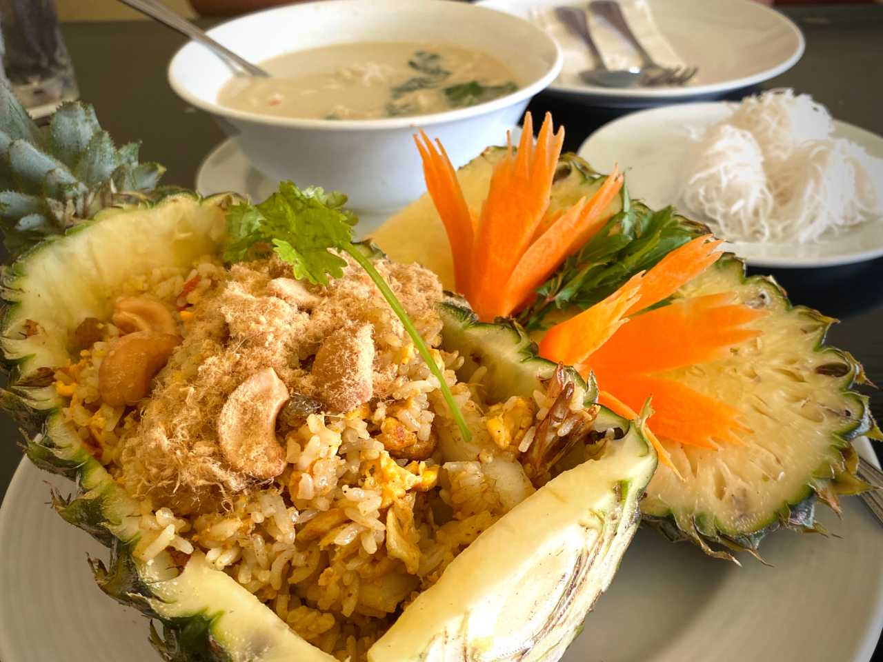 Pineapple fried rice and crab curry in Phuket Town